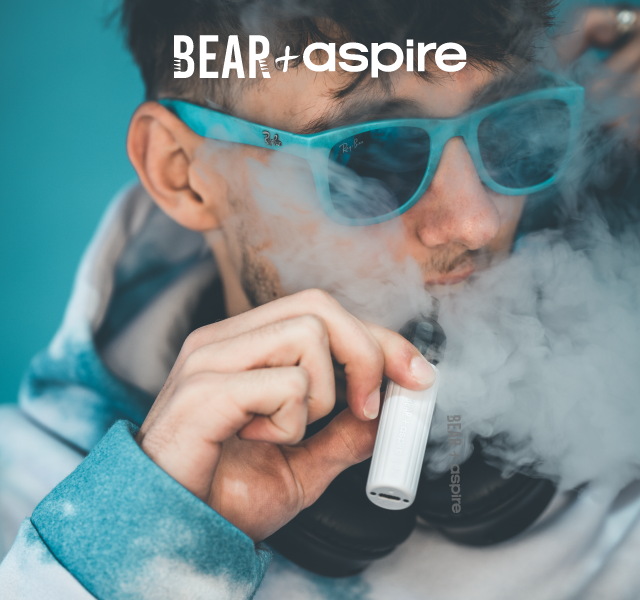 man using bear + aspire r1 3500 puff disposable vape
